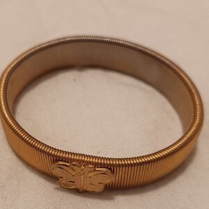 Gold Coil Bangle Bracelet with Butterfly Accent